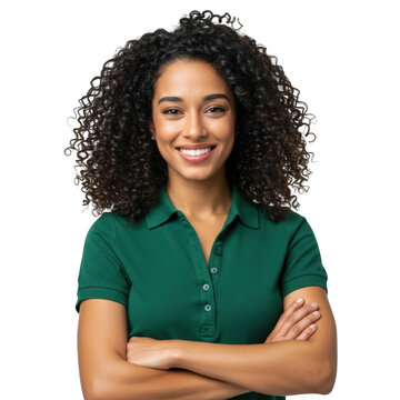 Smiling young woman with curly dark hair wearing a green collared shirt with arms crossed isolated on transparent background