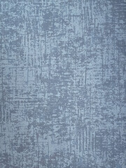 abstract textured surface with grainy effect in blue tones

