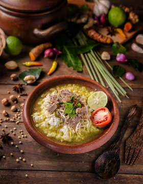 Fragrant beef soto with rich golden broth, tender meat slices, crispy fried shallots, and aromatic spices. A comforting bowl of warmth and flavor in every spoonful