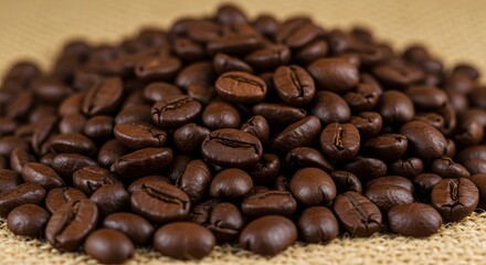 Naklejka premium Pile of Freshly Roasted Coffee Beans on Burlap