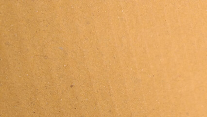 Background of brown kraft paper or cardboard texture, Abstract pattern of beige rough carton, old paper sheet, parchment or papyrus surface.