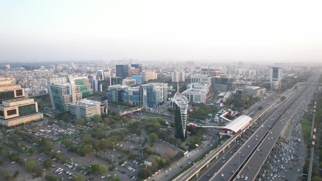 Aerial  Drone Footage of Buildings Exteriors at Cyberhub Cybercity Gurgaon Gurugram Delhi India rapid metro station