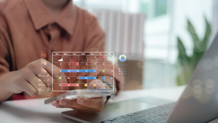 User managing digital calendar on smartphone with virtual interface and task schedule. Concept of time management, productivity planning, reminder system, and smart scheduling app.