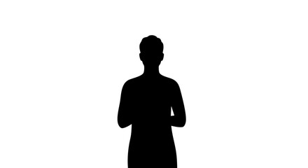 Silhouette of a person standing with hands clasped.