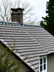 Gray background of old roof cover on private house