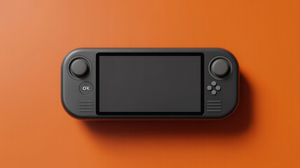 Black handheld gaming console on orange background