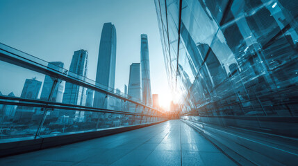 Fototapeta premium Modern city skyline with glass skyscraper reflections and sun flare creating dynamic urban atmosphere at sunset