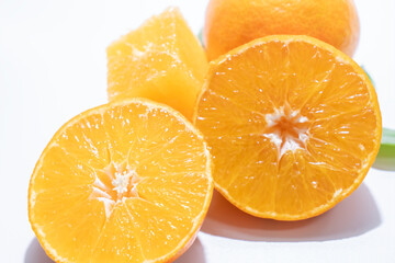 Fresh Mandarin Orange Segments on White Background