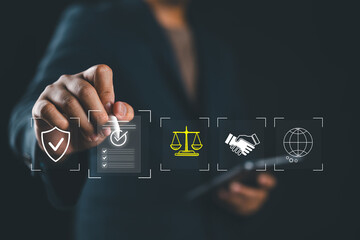 Legal agreement and Digital compliance concept with businessman's hand selecting contract icon, representing online regulation, law, approval process, and secure global business operations.