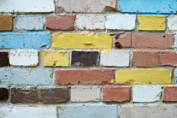 Detailed close up of multicolored brick wall texture and pattern