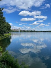 A lake in New York, USA, where clouds are reflected, creating a beautiful landscape
