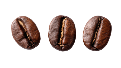 Close-up of three coffee beans, top view, showcasing their texture and rich brown color