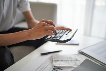 Man planning finance for insurance, loan real estate or property