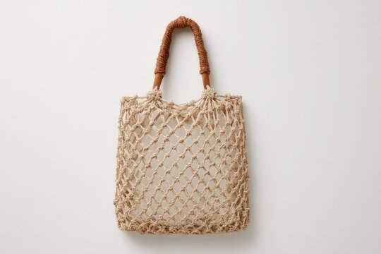 Beige woven tote bag with tan handles