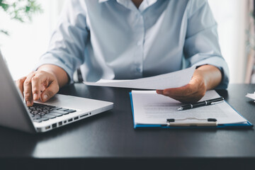 Business person with contract law and paper work for business finance, loan application form,...