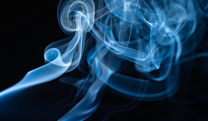 Fototapeta premium Abstract Swirls of Blue Smoke Wisps Creating an Ethereal and Mesmerizing Visual