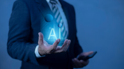 Businessman holding Artificial Intelligence brain analysis information.