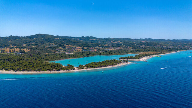 Aerial drone view of Port Glarokavos and lagoon beach in Kassandra penisula Chalkidiki Greece