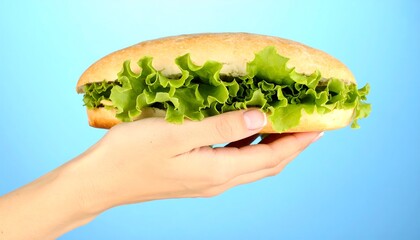 Hand Holding Fresh Sandwich