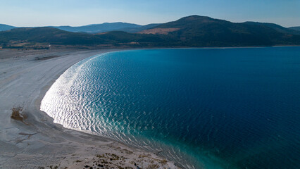 The tranquil beauty of Salda Lake - Turkey with its crystal clear turquoise waters and stunning...