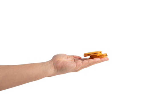 Square crispy snack in hand on transparent background