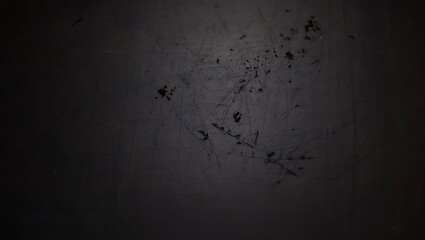 A dark, grunge texture creates a distressed and abstract background