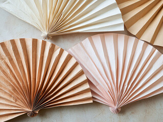 Delicate Paper Fans in Soft Tones for Creative Projects and Decor