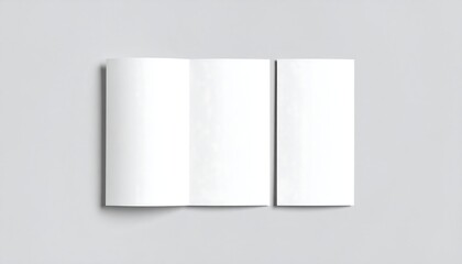 Blank White Brochure Mockup on Gray Surface, Top View, Shadow Detail.