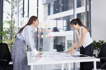 businesswoman working together with marketing strategy analysis at meeting room.