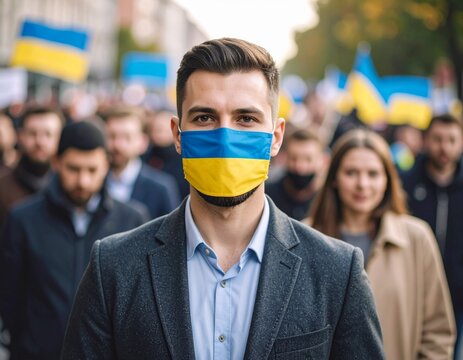 Man Wearing Ukrainian Flag Face Mask in Crowd