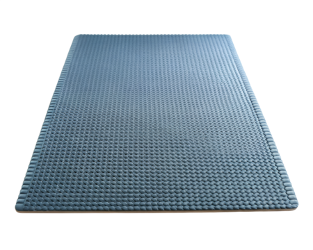 A blue textured exercise mat isolated on a transparent background