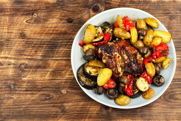 Baked meat dish with vegetables.