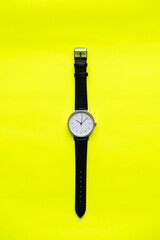 Wristwatch on Bright Yellow Background