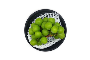 Green grapes on a white background