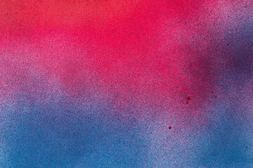 赤色と青色のスプレー塗料で塗った背景