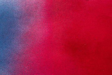 赤色と青色のスプレー塗料で塗った背景