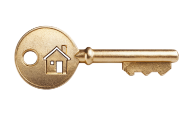 Gold key with house symbol. A brass-colored key, round head, depicts a small house silhouette