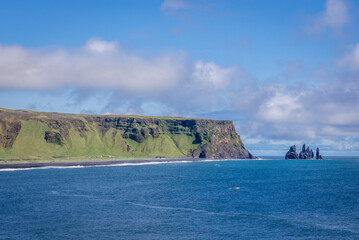 Reynisdrangar seastacks seen from Dyrholaey foreland located on the south coast of Iceland