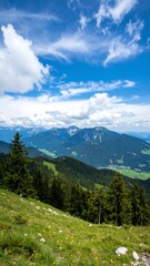 Fototapeta premium Mountain vista, sunny day, green valley