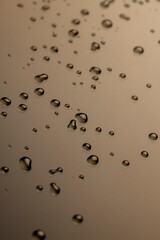 water makes the waterproof smooth surface completely wet, part of the phone screen is covered with drops of water, close up