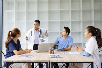 Medical team brainstorming having a meeting in conference room at hospital, Medical technology and health care concept.