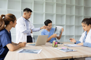 Medical team brainstorming having a meeting in conference room at hospital, Medical technology and health care concept.