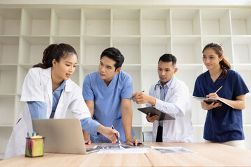 Medical team brainstorming having a meeting in conference room at hospital, Medical technology and health care concept.