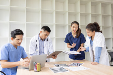Medical team brainstorming having a meeting in conference room at hospital, Medical technology and health care concept.