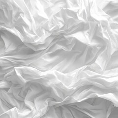 Fototapeta premium Close-up of crumpled, white fabric with soft folds and textures