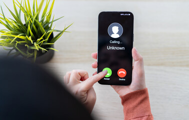 Phone scam alert with hacker and scammer calling unknown number, cybercrime, data theft, phishing...