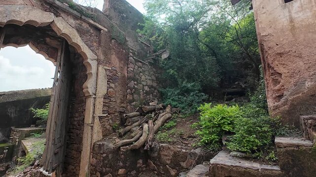 Abandoned Taragarh Fort Ruins with Overgrown Vegetation in Bundi Rajasthan, India 