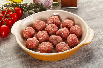 Uncooked raw beef meatball minced