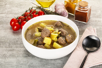 Soup with meatball and potato