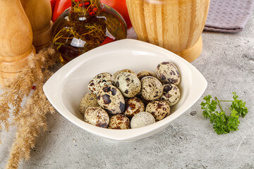 Raw quail egg in the bowl